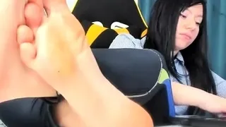 Brunette with foot fetish rubs big dick with her feet in POV