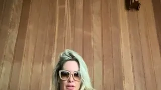 An amateur hitchhiking blonde is toying with drivers cock