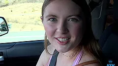 Shaved pussy Zoey Zimmer teases and gets fingered in the car