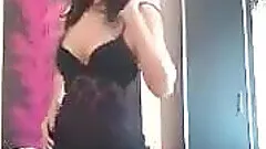 Homemade video of a brunette chick with natural boobs wearing lingerie