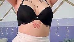 Tattooed chick with natural tits fingering her dripping cunt