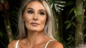 Blonde Mandy Rhea sucking her lover's big black cock by the pool