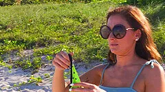 Gorgeous brunette teasing her boyfriend on the beach - Ally