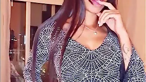 Homemade video of a brunette chick with big tits having fun