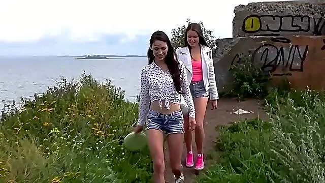 Adorable girls make out in the outdoor and reach the orgasm together