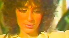 Naughty brunette chick pleasuring her puss with a dildo - Retro