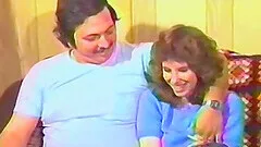 Retro porn video of a brunette wife being fucked on the bed