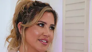 Gorgeous Caitlin Bell with big tits sucking a big black cock