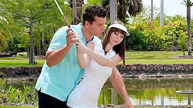 Petite woman receives the big dick after a naughty golf lesson