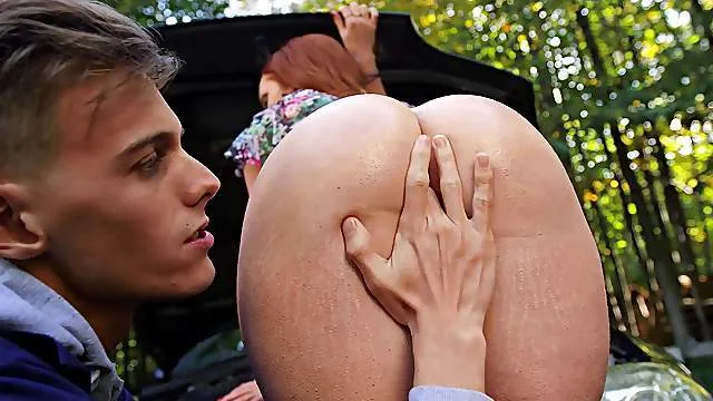 Pure lust in outdoor anal shag for a top redhead