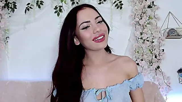 Brunette babe is about to get completely naked for her audience