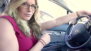 Blonde Cory Chase enjoys while giving a nice handjob in the car