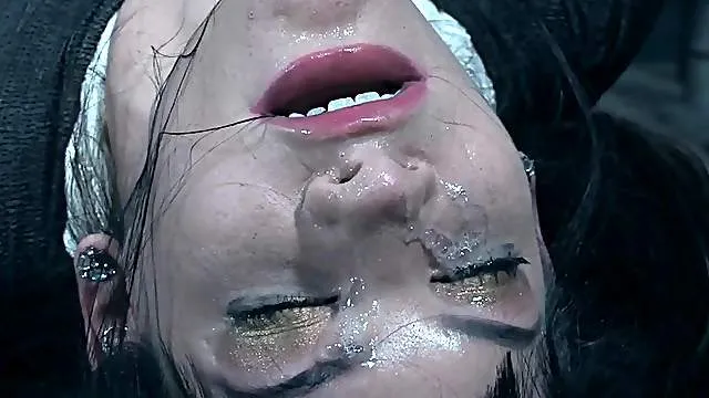 Slim girls mummified together in a dungeon