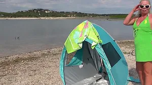 Solo wife Beth takes off her clothes to tease on a public beach