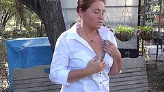 Gypsy Leigh enjoys while pleasuring her pussy outdoors in the park