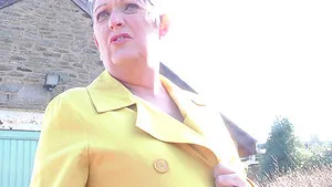 Chubby granny Marika masturbating with a toy on the floor