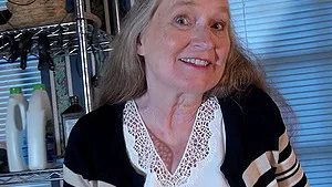 Solo granny Maggie Mae takes off her panties to play with toys