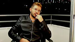 Cute Latino jerks off on his balcony