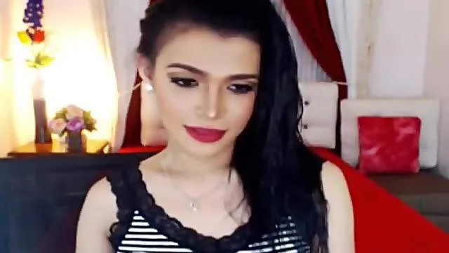 Gorgeous trans girl in red lipstick does a webcam show