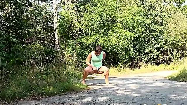 Pretty dress on a girl peeing in public