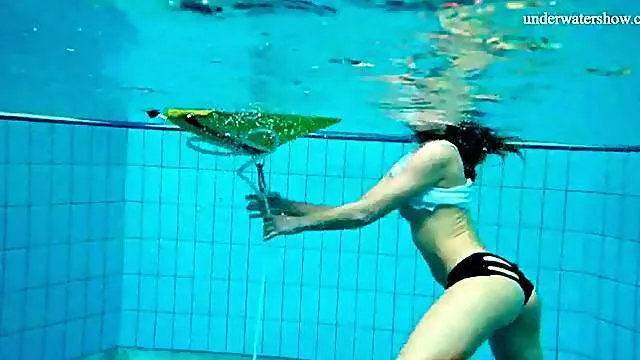 Hot bikini bottoms on a swimming teen cutie