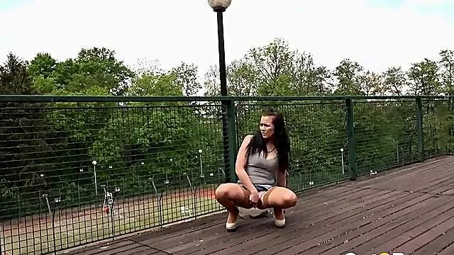 Cutie with a full bladder pees in public