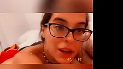 Solo chick Abbie Maley with glasses moans while fingering herself