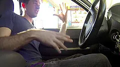 Food fetish video of a dude drinking in his expensive car