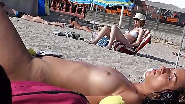 Sexy small tits on ladies hanging out at the beach