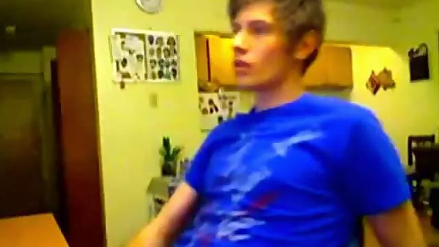 Teen up on his desk stroking cock on webcam