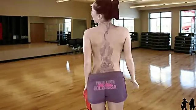 Workout video with a hot striptease from the babe