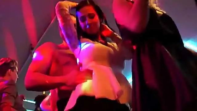 Male strippers entertain horny club girls