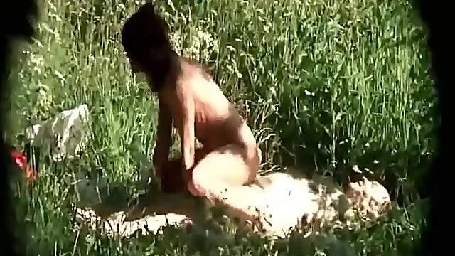 Spying on a married couple fucking lustily outdoors