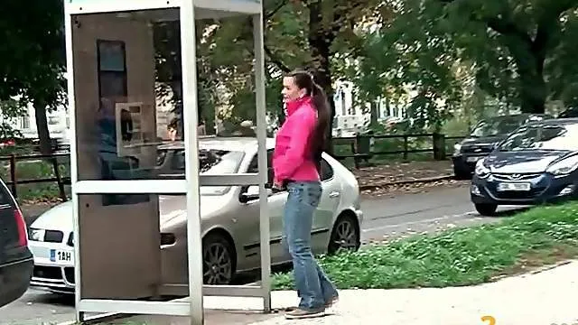 Pretty girl taking a piss on a public street