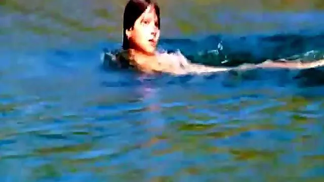 Naked chick skinny dipping in the lake