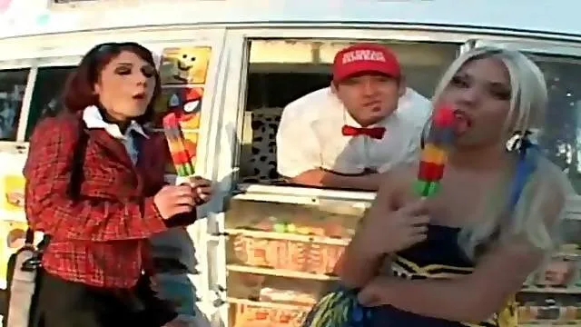 Schoolgirl and cheerleader lustily lick popsicles