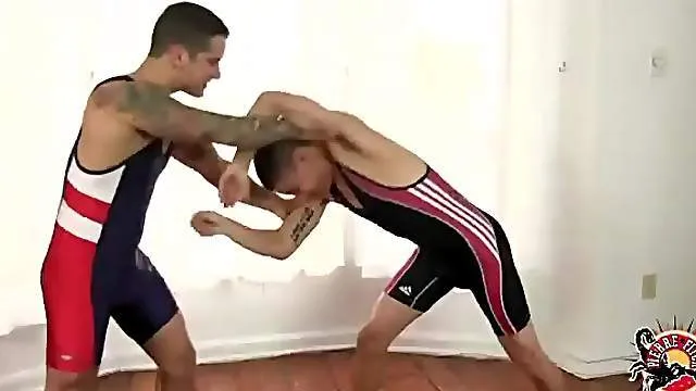 Two wrestling guys end up in an ass fuck
