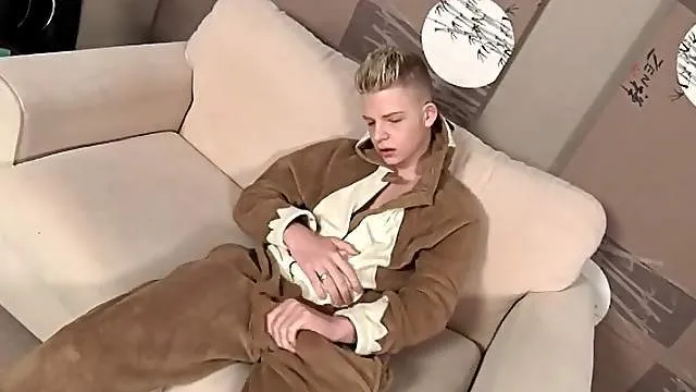 Twink in soft pajamas strips and strokes dick