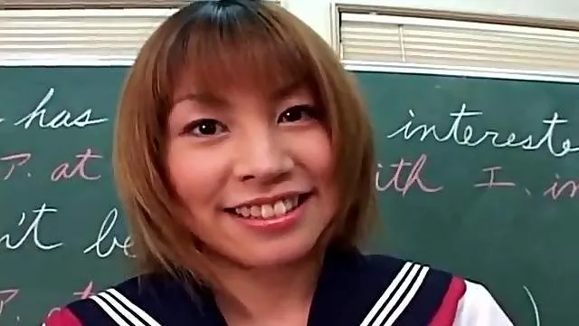 Schoolgirl shows her small tits in class