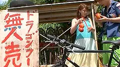 Amazing Syouko Akiyama giving a blowjob to her BF by the beach