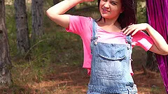 Outdoors video of sexy Lolly J pleasuring her puss in the woods