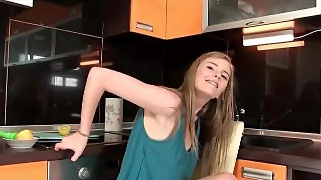 Skinny teen blonde in erotic solo striptease