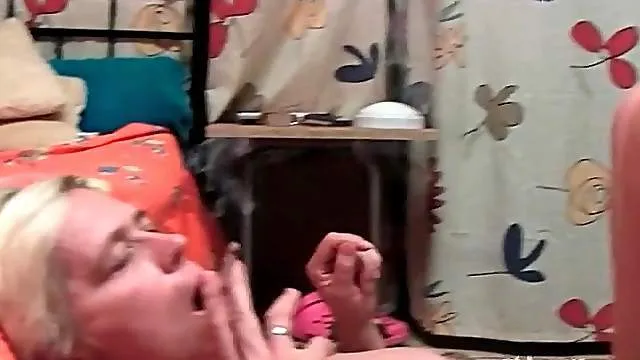 Fat guy smoking and blown by a mature blonde