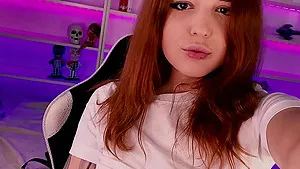 Redhead darling GiveMeyourSoul drills her ass with a fuck machine