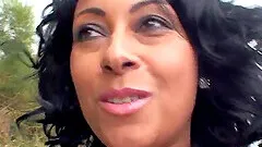 Naughty MILF Danica Collins flashing her big boobies outdoors