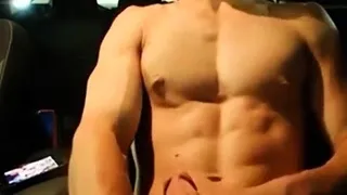 Big-Cocked Man Strokes in Car While Watching Porn