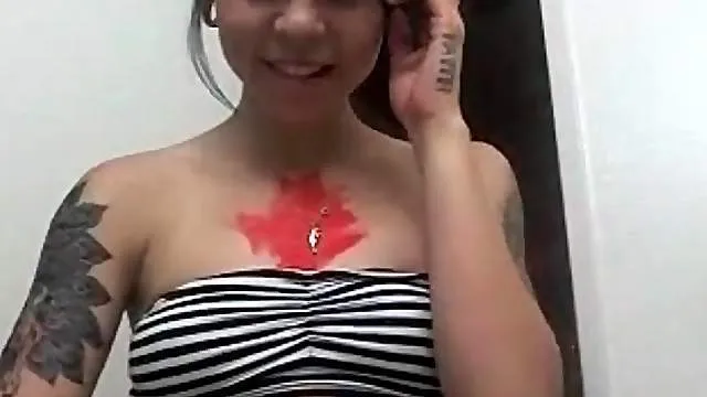 Teen camgirl shows off body paint and tattoos