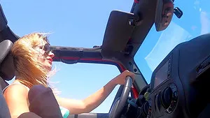 Kinky chick Leidy De Leon gives a handjob while driving a car