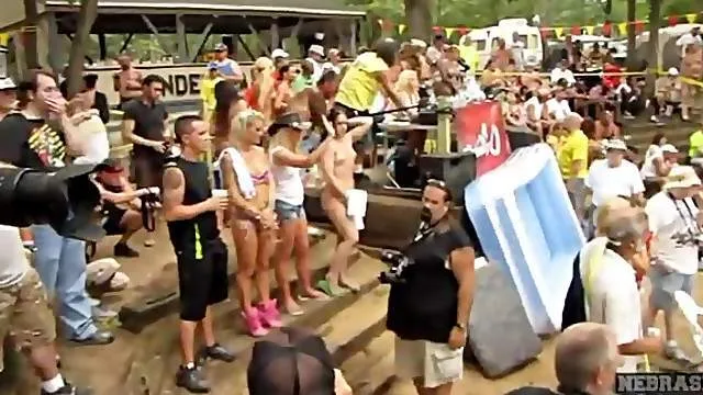 Big outdoor party with lots of hot naked ladies