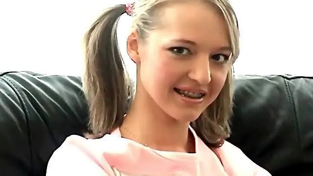 British teen in pigtails and braces strips solo